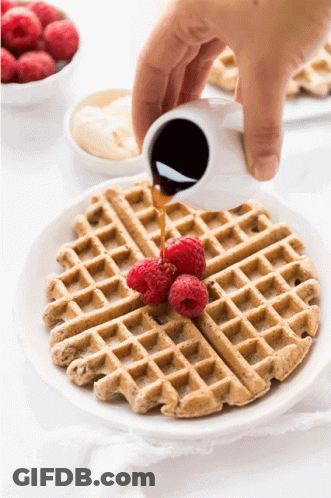 Waffle With Raspberries And Syrup GIF