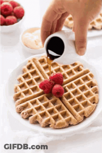 Waffle With Raspberries And Syrup GIF