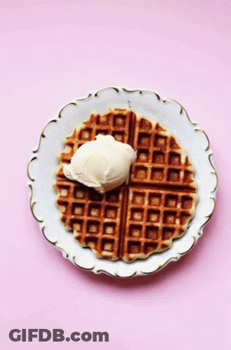 Waffle With Whipped Cream And Spoon GIF