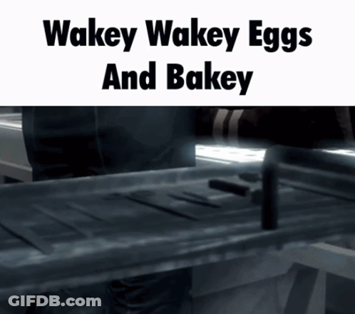 Wakey Wakey Eggs And Bakey Is Written On A Screen GIF