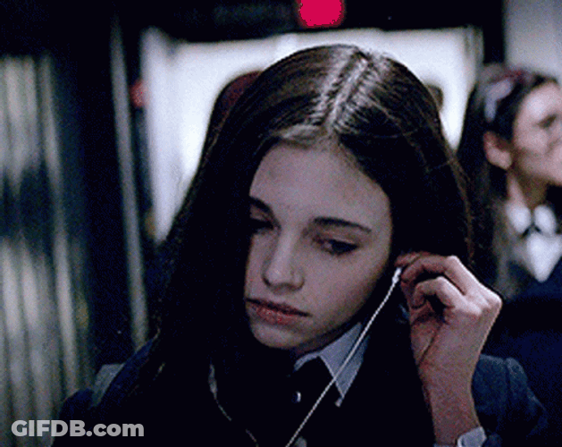 Walking India Eisley Putting On Earphones GIF