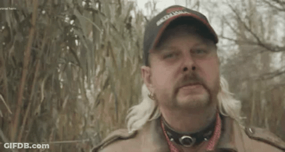 Walking Mullet Haired Joe Exotic GIF