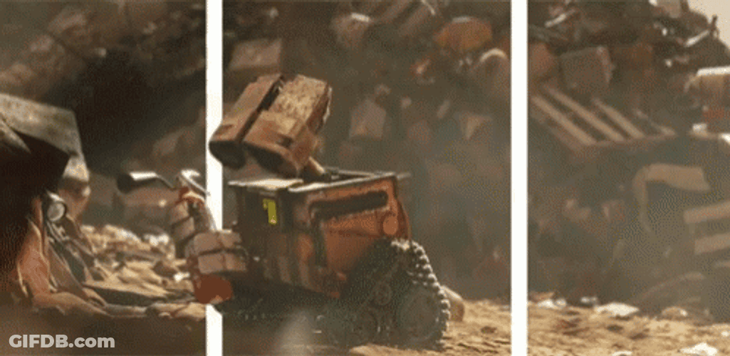 Wall E Startled With Fire Extinguisher GIF