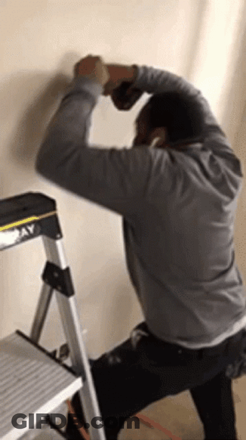 Wall Hammer Time GIF