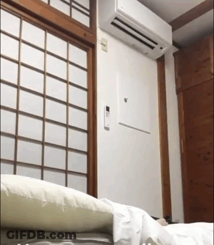 Wall-Mounted White Air Conditioner GIF