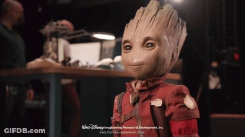 Walt Disney Advertisement Wooden Groot Doll GIF