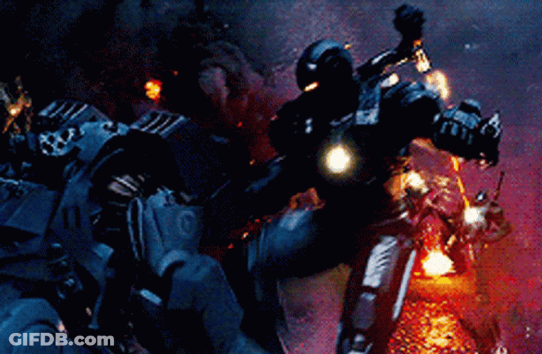 War Machine And Iron Man Shooting Enemies GIF
