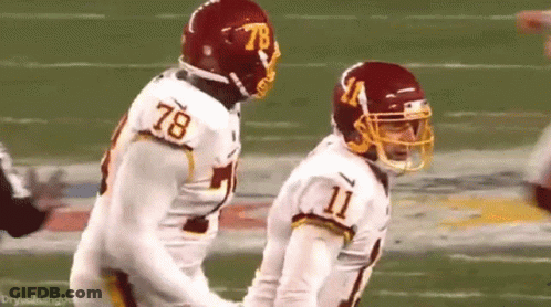 Washington Redskins Players Number 78 And 11 On Field GIF