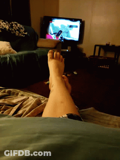 Watching TV While Relaxing GIF