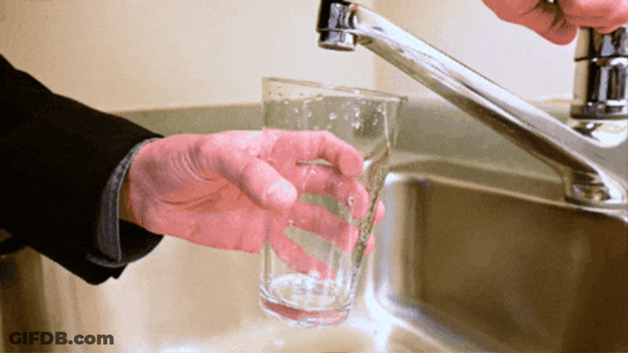 Water Pouring In Glass From Faucet GIF