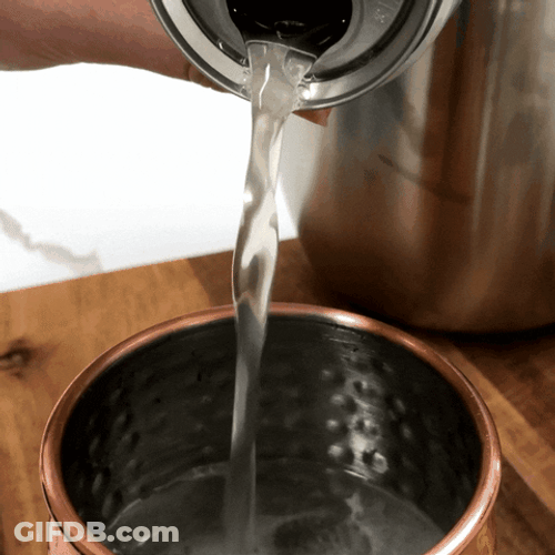 Water Pouring Inside Steel Cup GIF