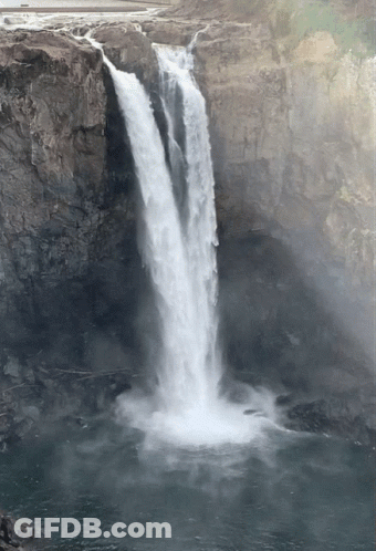 Waterfall Surrounded By Cliffs And Road GIF