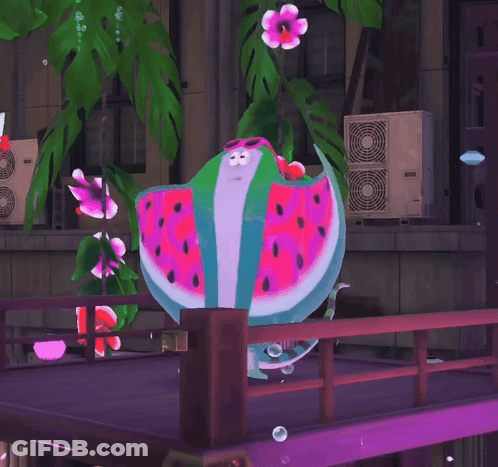 Watermelon Shaped Kite On Balcony Next To Building GIF