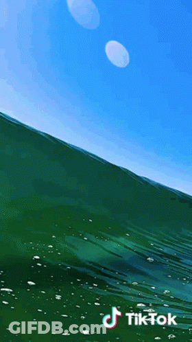 Wave With Blue Sky Saying TikTok GIF
