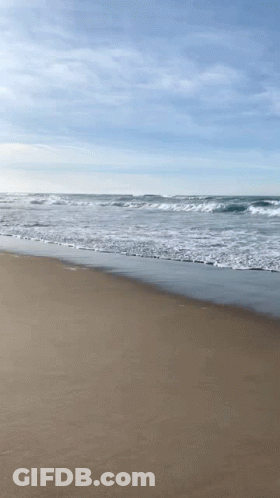Waves Crashing On Beach Blue Sky GIF