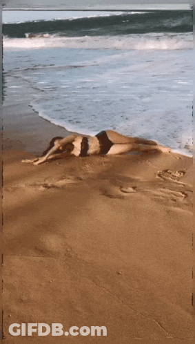 Waves Crashing On Sandy Beach GIF