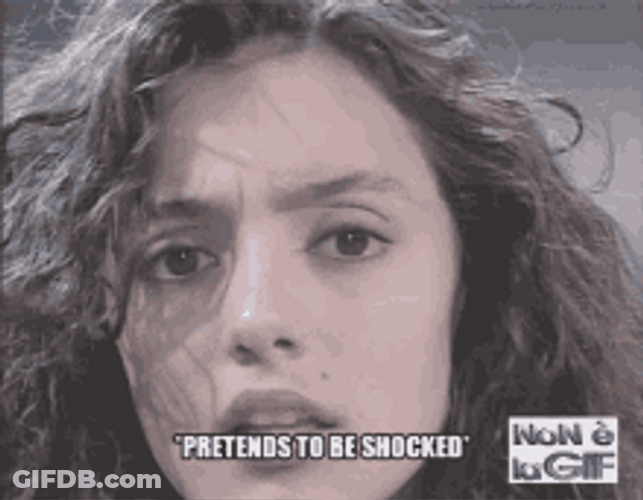 Wavy Hair Woman Pretends To Be Shocked GIF