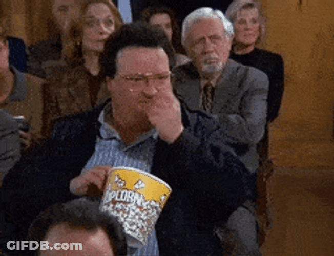 Wayne Knight Eating Popcorn In Seinfeld Meme GIF