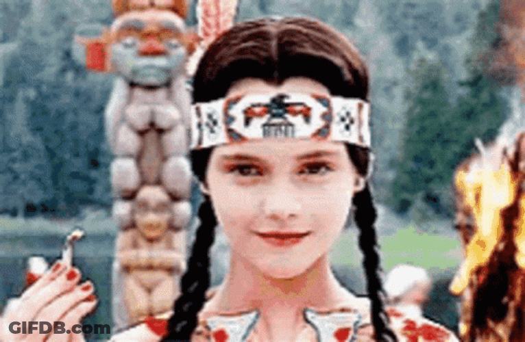 Wednesday Addams On Fire Background GIF
