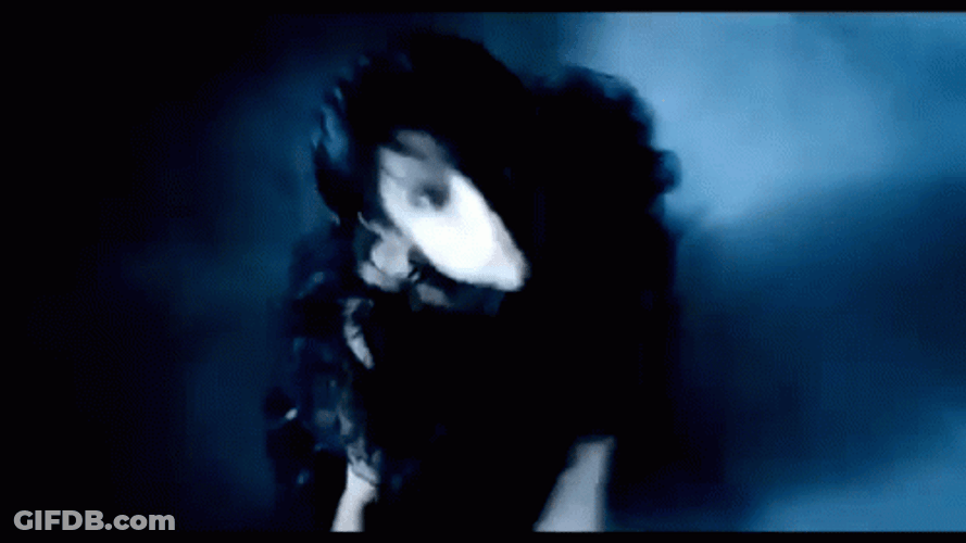 Wednesday Looking Up Hand Sway Dancing GIF