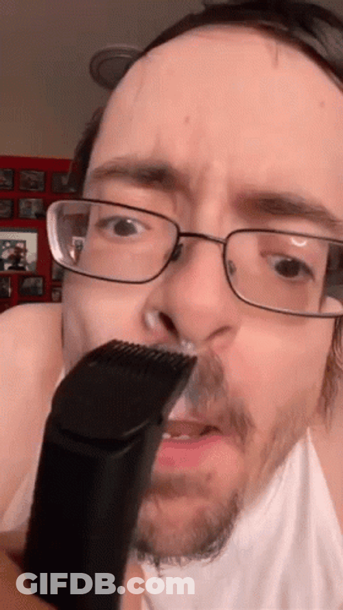Weird Guy Trimming Mustache GIF