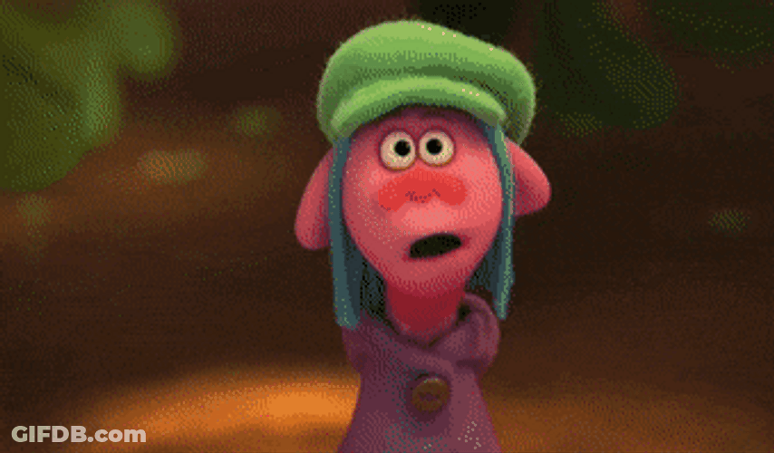 Weird Looking Troll Giving Birthday Cake GIF
