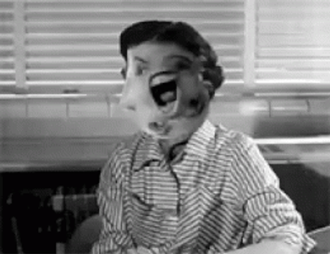 Weird Rotating Faces GIF