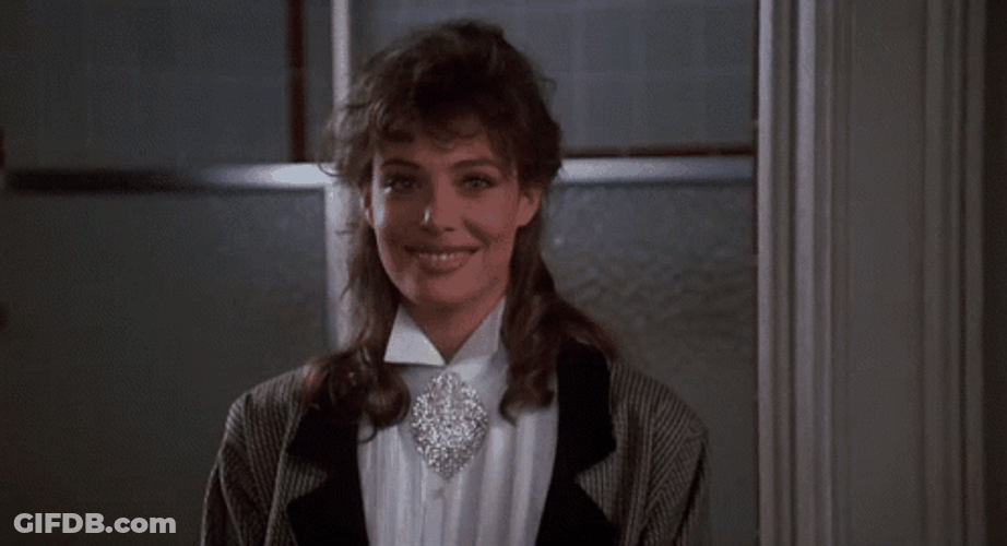 Weird Science Girl Does Flying Kiss GIF