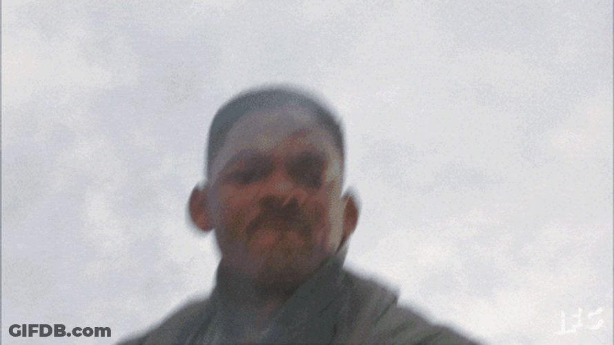 Welcome To Earth Will Smith Punch Alien GIF
