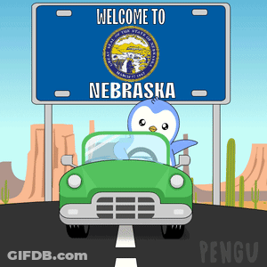 Welcome To Nebraska Sign With Penguin In Green Car GIF
