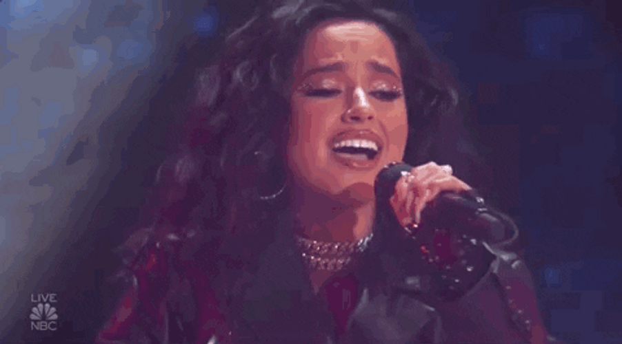 Well-Dressed Becky G Emotional Singing GIF