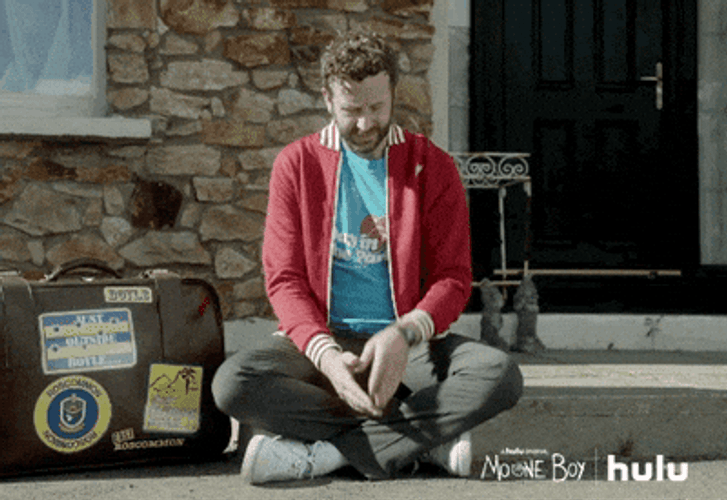 Well We're Waiting Sitting On Sidewalk GIF
