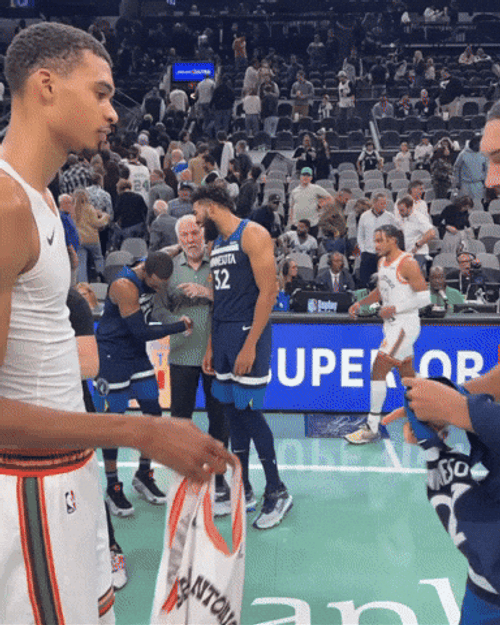 Wemby Rudy Gobert Jersey Swap GIF