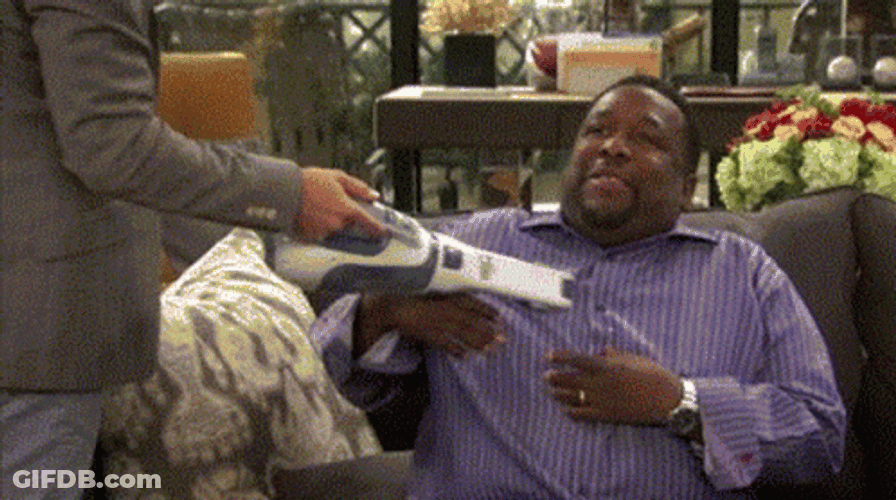 Wendell Pierce Tickled By Vacuum Cleaner GIF