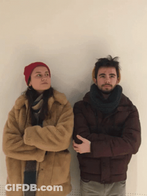 Were Waiting Man And Woman Leaning Against Wall GIF