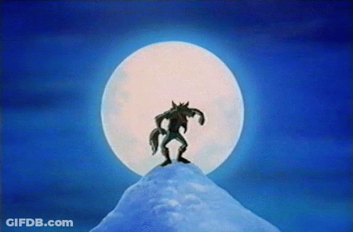 Werewolf On Snowy Mountain Under Full Moon GIF