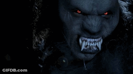 Werewolf With Red Eyes And Sharp Teeth GIF