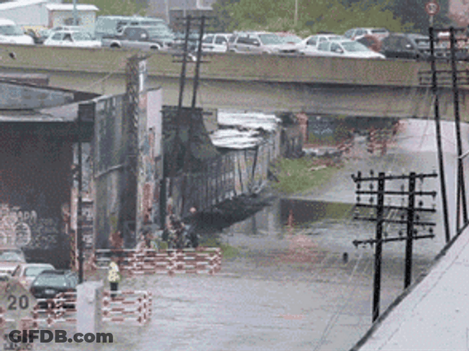 Wet Road Passing Train GIF