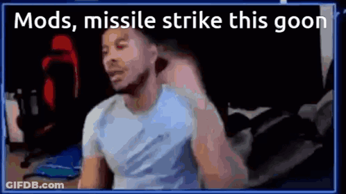 What Is A Man To A God Written On Wall In Dark Room GIF