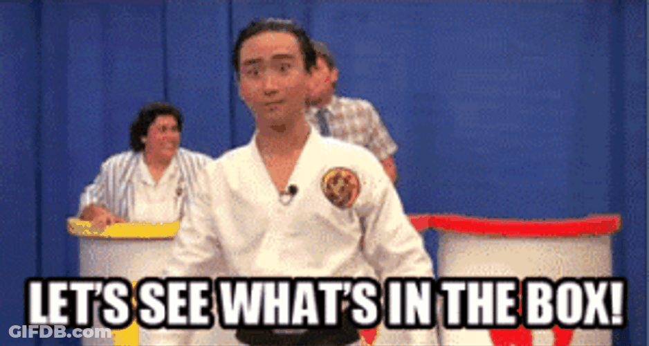 Whats In The Box Asian Guy UHF 1989 GIF