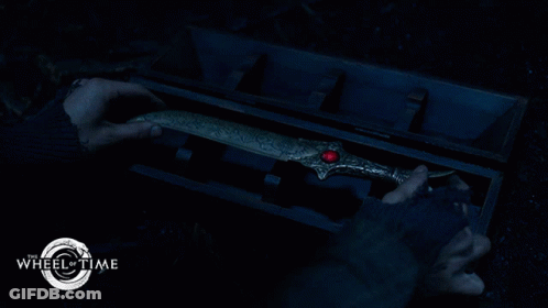 Wheel Of Time Poster Man Holding Sword GIF