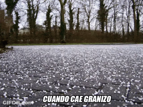 When Cae Granizo Is Written On A Gray Surface GIF