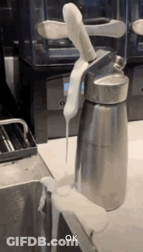 Whipped Cream Bottle Next To Sink GIF