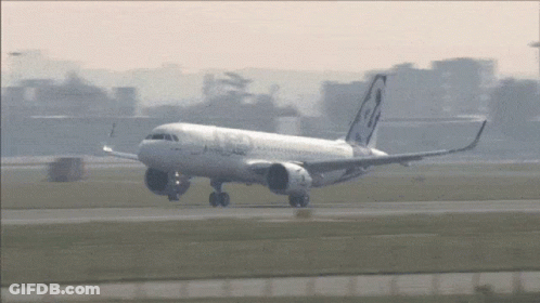 White Airplane With A320 On Tail GIF