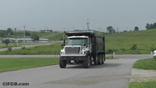 White And Black Dump Truck With NC License Plate GIF