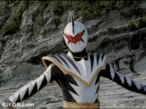 White And Black Superhero With Red Star On Face GIF