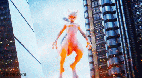White And Orange Monster Standing In Front Of Building GIF