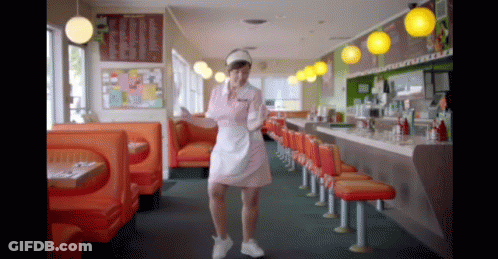 White Apron Waitress Dancing In Diner GIF
