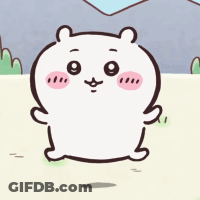 White Bear With Pink Cheeks Standing In Field GIF
