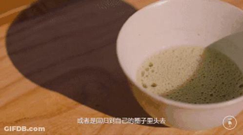 White Bowl Filled With Green Liquid GIF